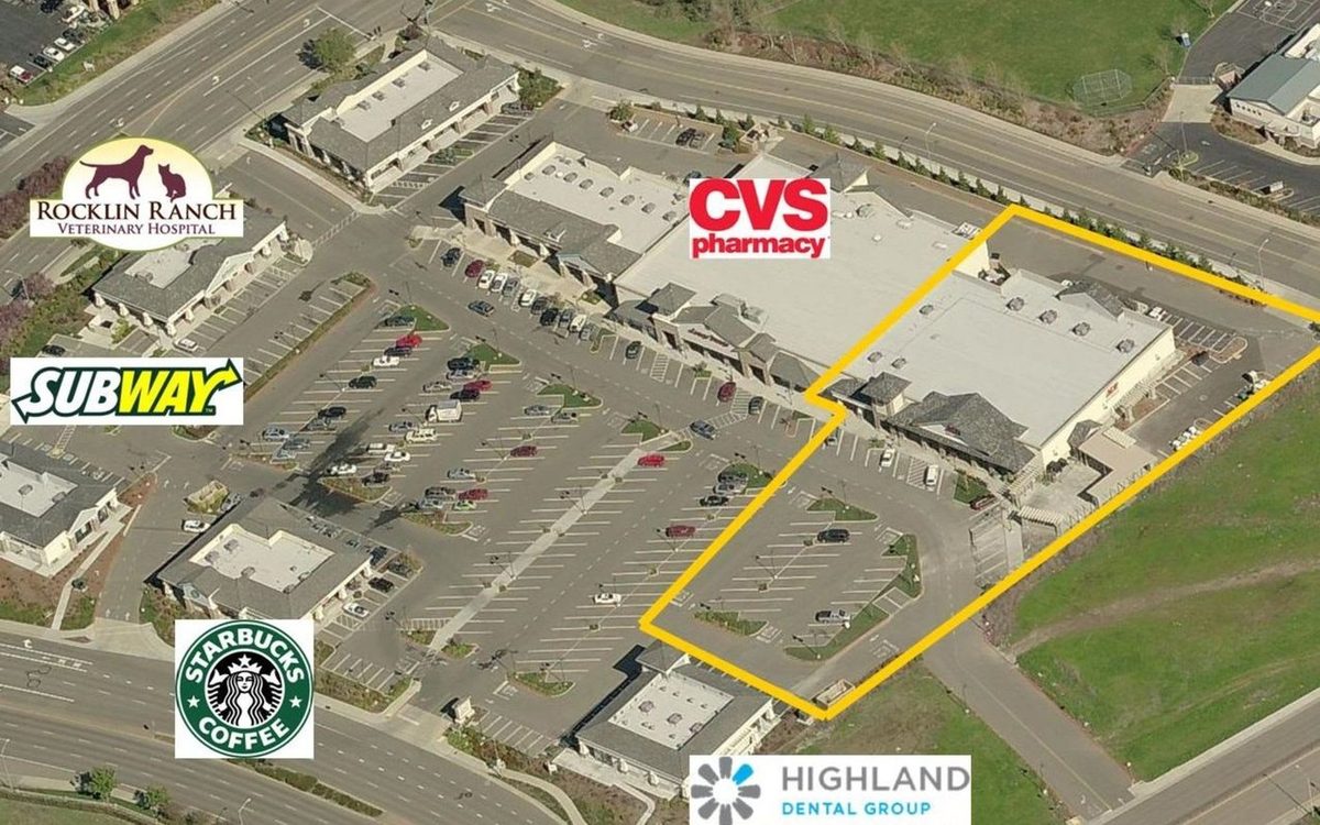 Aerial view of a Northern California neighbourhood retail centre with the site boundary marked